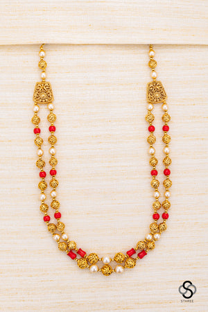 Two liner gold balls with pearls and coral