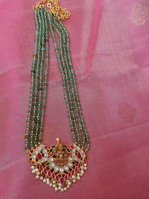 Lakshmi kundan set in green beads
