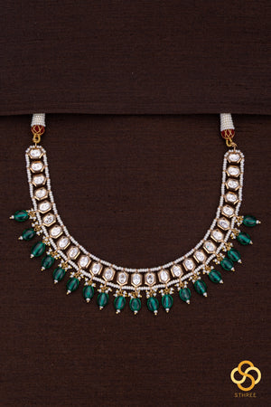Kundan with pearls and green beads hangings