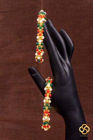 Coral red, green and pearl kada