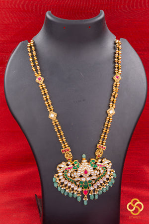 Jadau kundan padakkam (Green) - In a special rettai chain