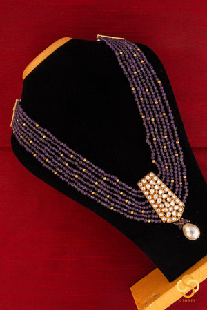 Amethyst beads with a kundan pendant