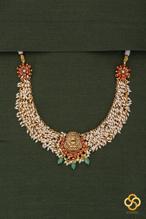 Lakshmi pendant with pearls