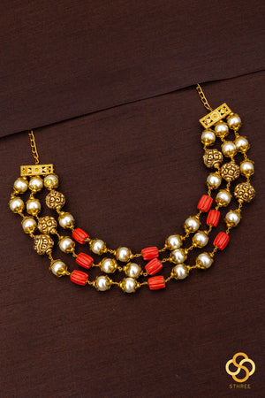 Three liner - Carved coral, pearls and gold balls