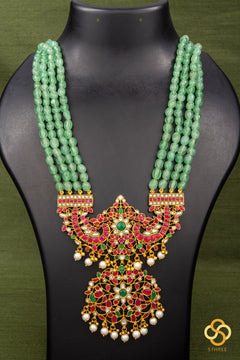 Makarakanthi Pendant in Four Lines Light Green Beads
