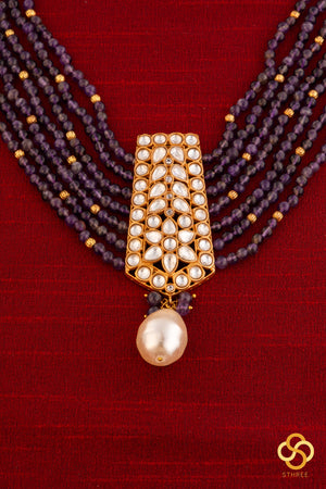 Amethyst beads with a kundan pendant