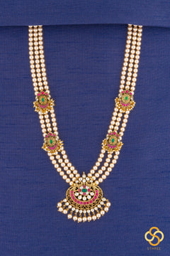 Swarovski three-liner pearls with a chandbali pendant and mogappu