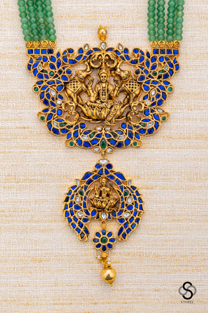 Four liner green beads with lakshmi Pendant - Sapphire blue