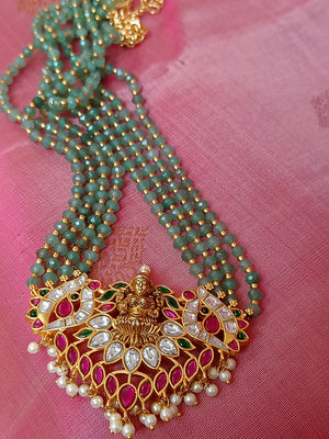 Lakshmi kundan set in green beads