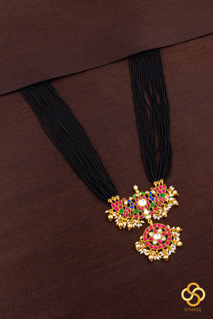 A bunch of black cut-beads strands - Mayurakanthi haram -Ruby red