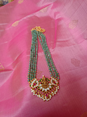 Lakshmi kundan set in green beads