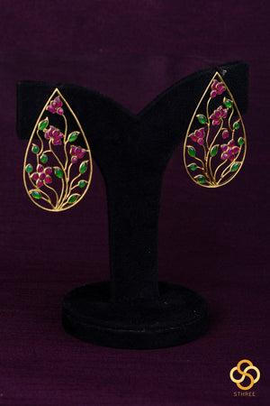Jadau kundan earrings - Ruby red flowers with green