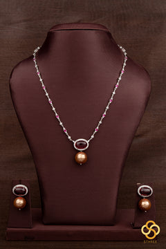 Zircon and ruby necklace set, with pearl hanging