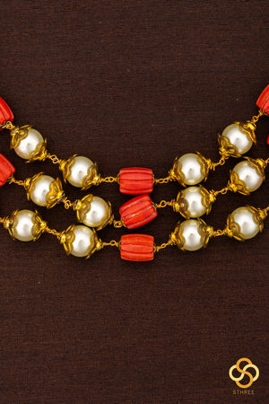 Three liner - Carved coral, pearls and gold balls