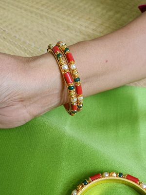 Coral, pearl and emerald green bangles