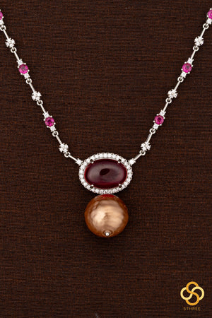 Zircon and ruby necklace set, with pearl hanging