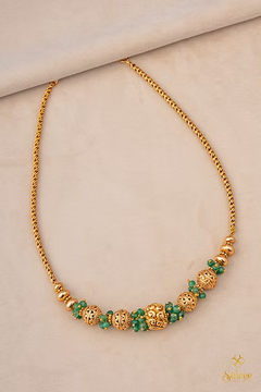 Green beads with Gold ball