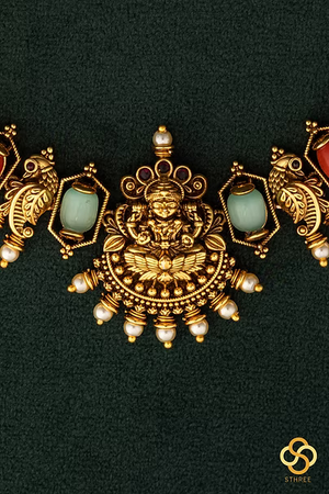 Lakshmi pendant with coral and green stones