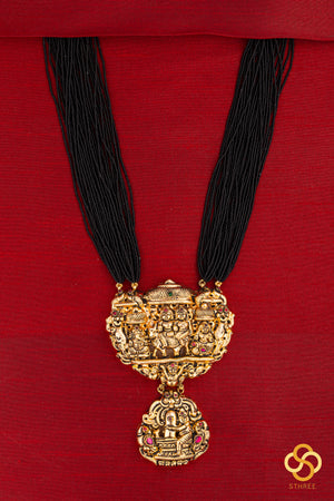 A bunch of black cut-beads strands - The Gowri Shankaram pendant