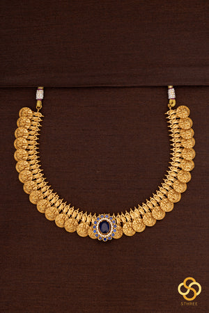 Lakshmi kasumalai with a sapphire blue  mogappu