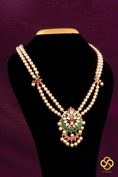 Swarovski two-liner pearls with a chandbali pendant - Emerald green