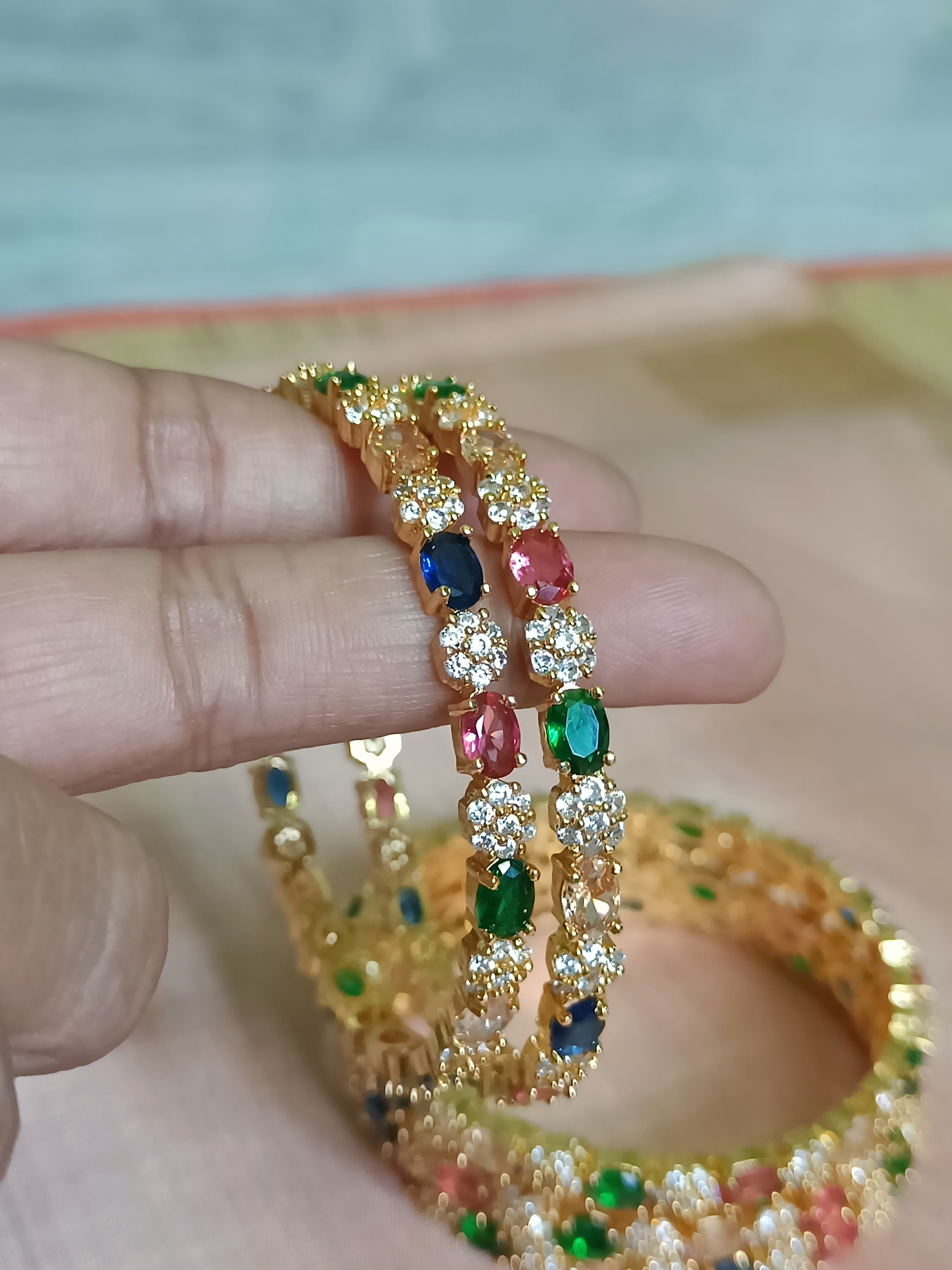 Seven stone diamond setting with multi colour stones