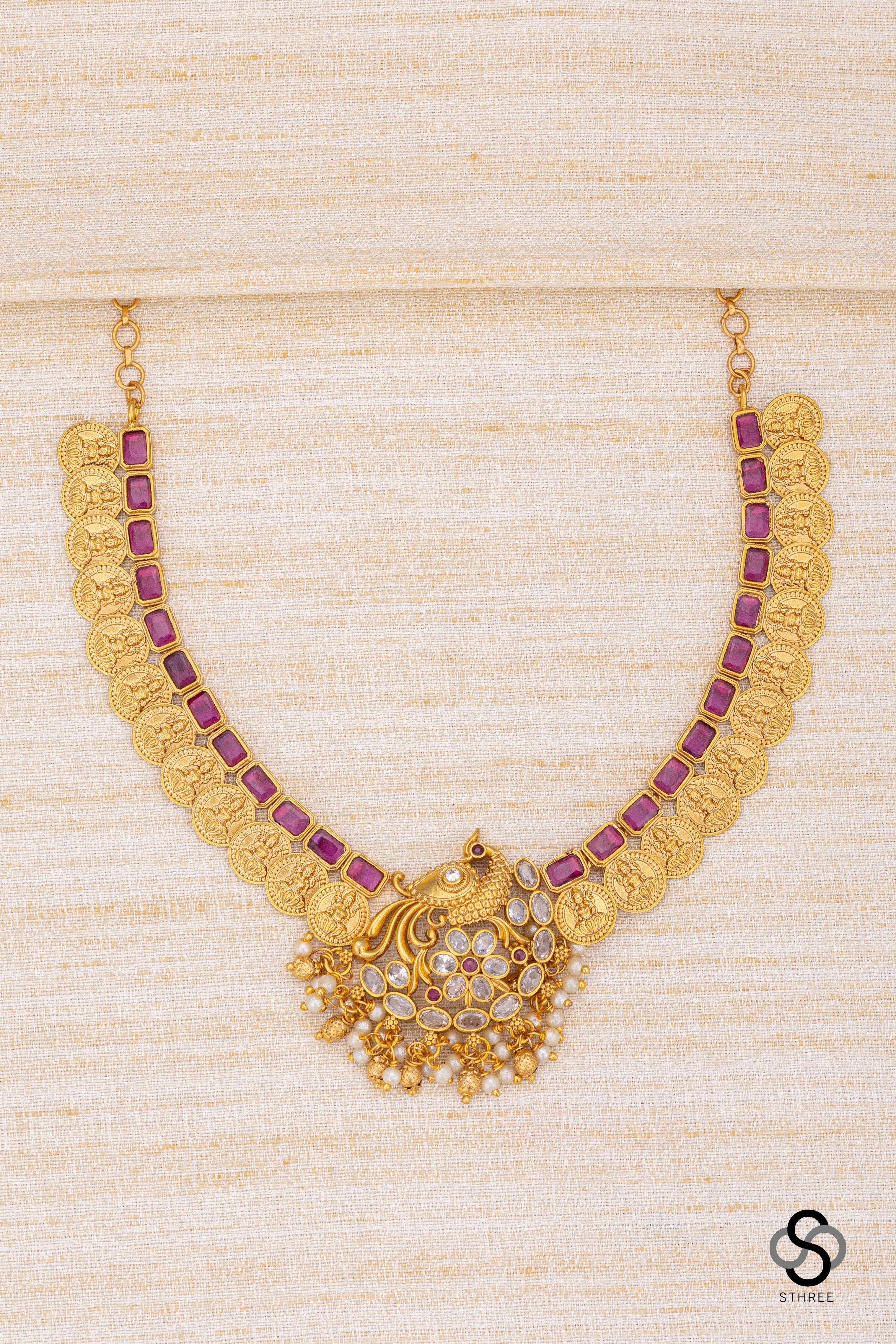 Mayil pendant with lakshmi coins