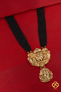 A bunch of black cut-beads strands - The Gowri Shankaram pendant
