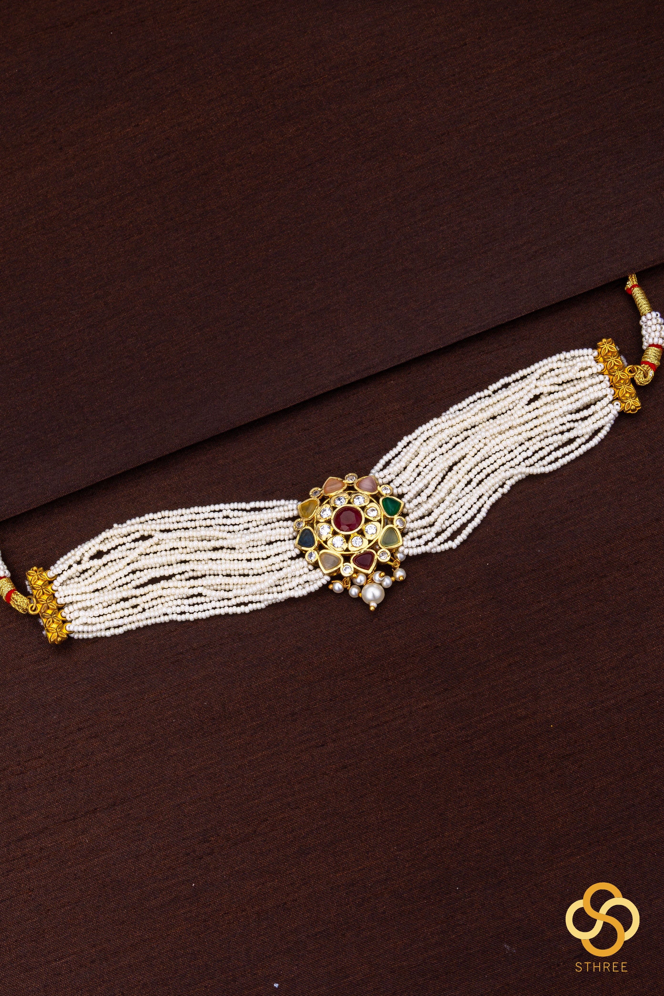 Pearl bunch with navarathna  pendant