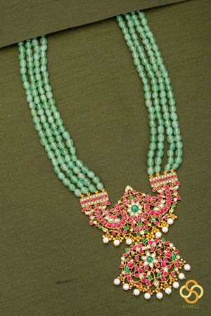 Makarakanthi Pendant in Four Lines Light Green Beads