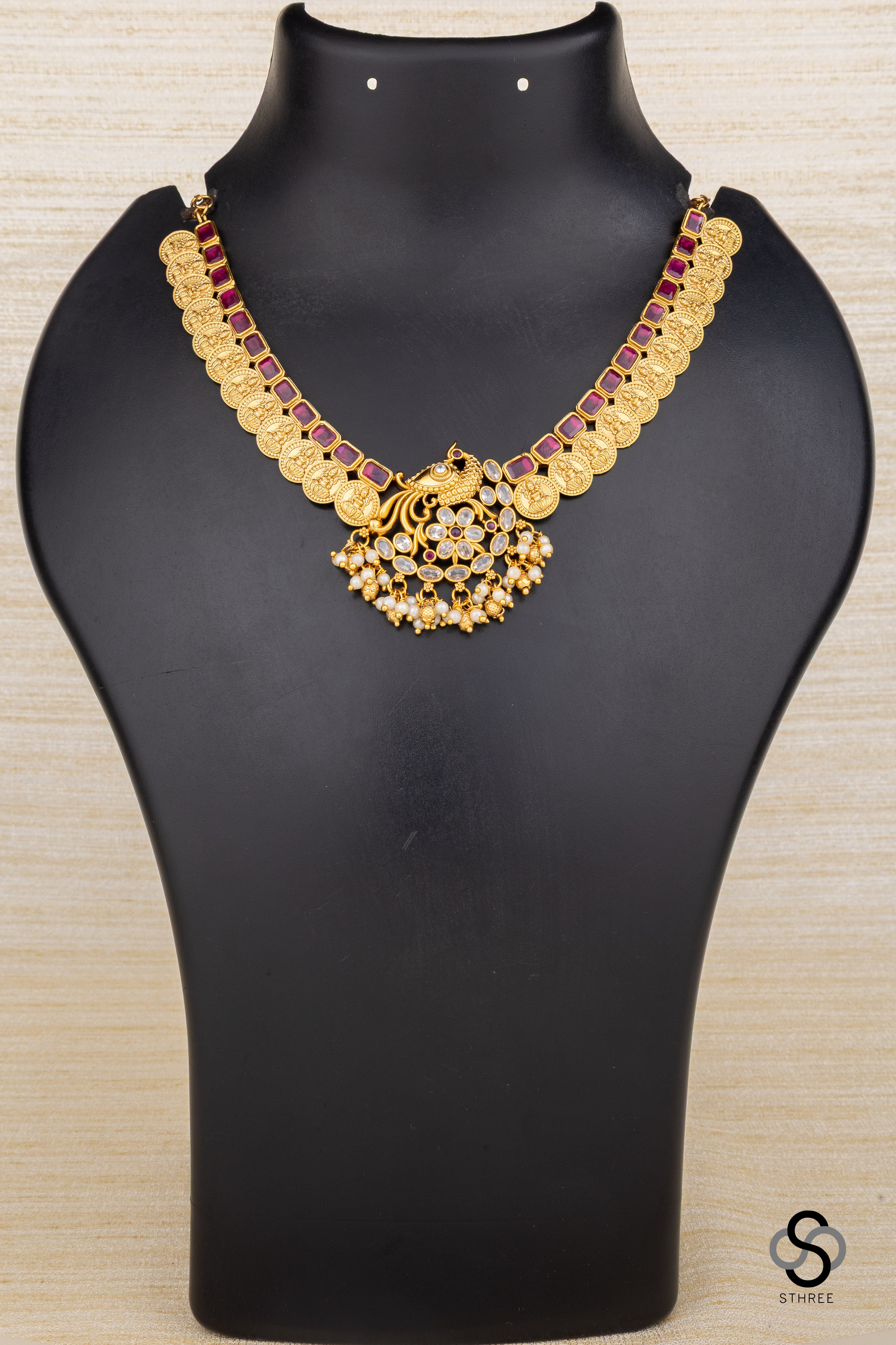 Mayil pendant with lakshmi coins
