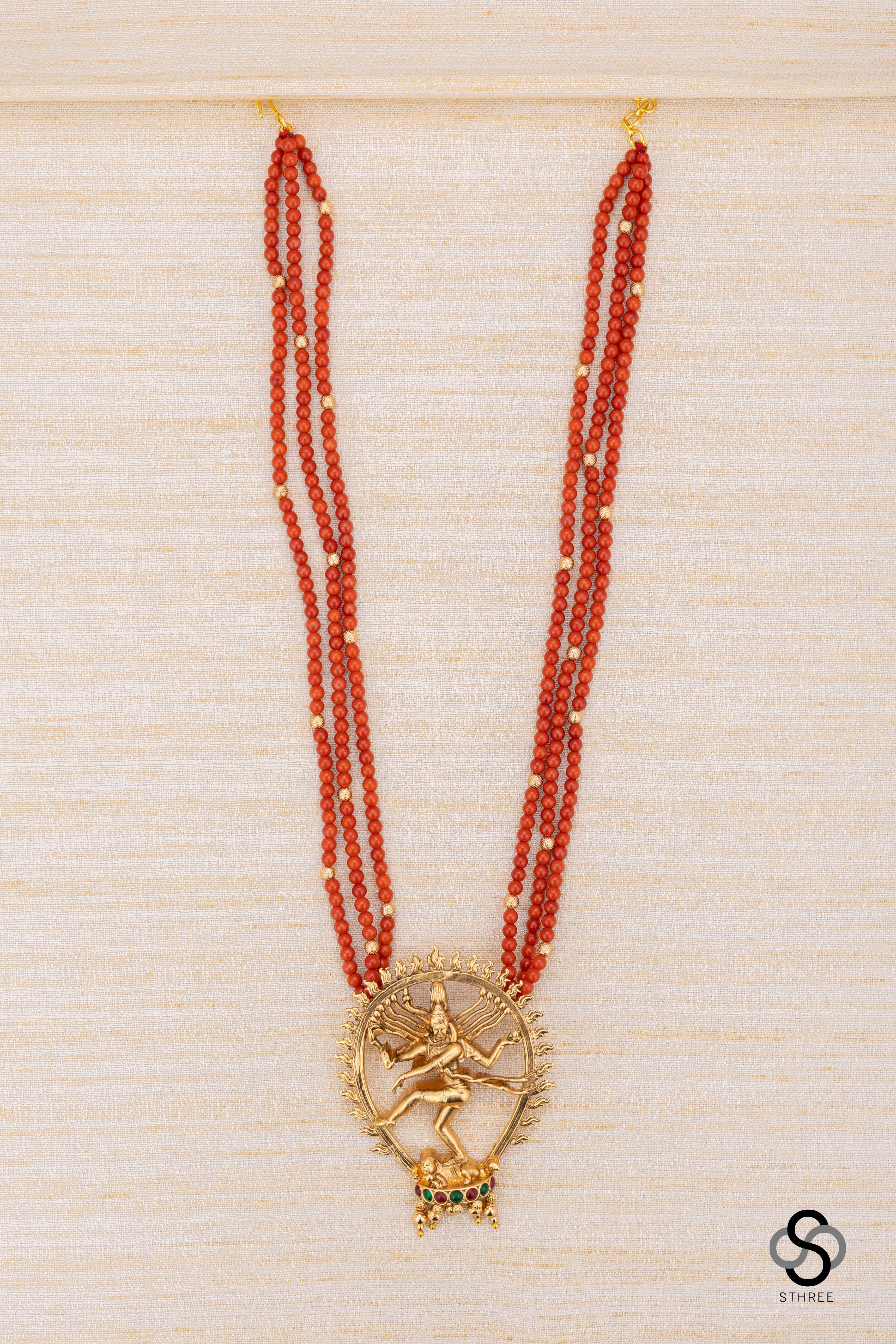 Natarajan pendant with three liner coral set