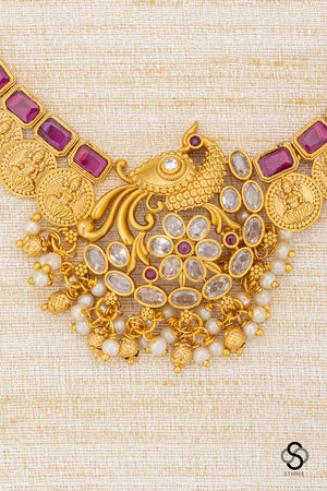 Mayil pendant with lakshmi coins