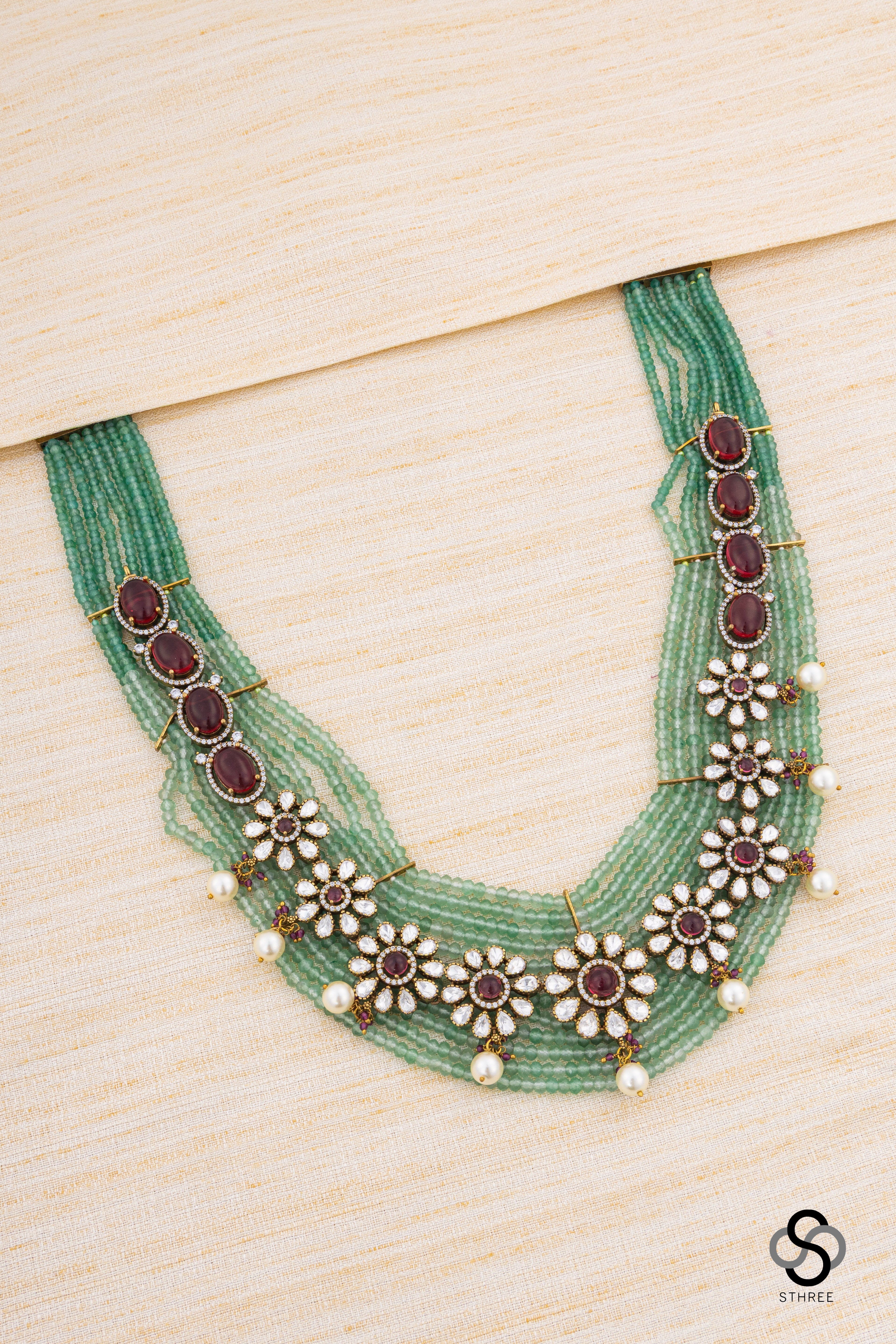 Zircon and Flower haram - Antique finish gold with green beads