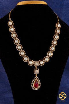 Kundan Necklace Set with Ruby Red Centerpiece