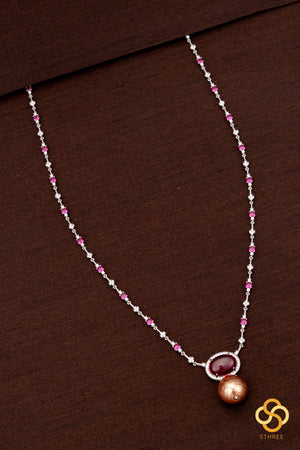 Zircon and ruby necklace set, with pearl hanging