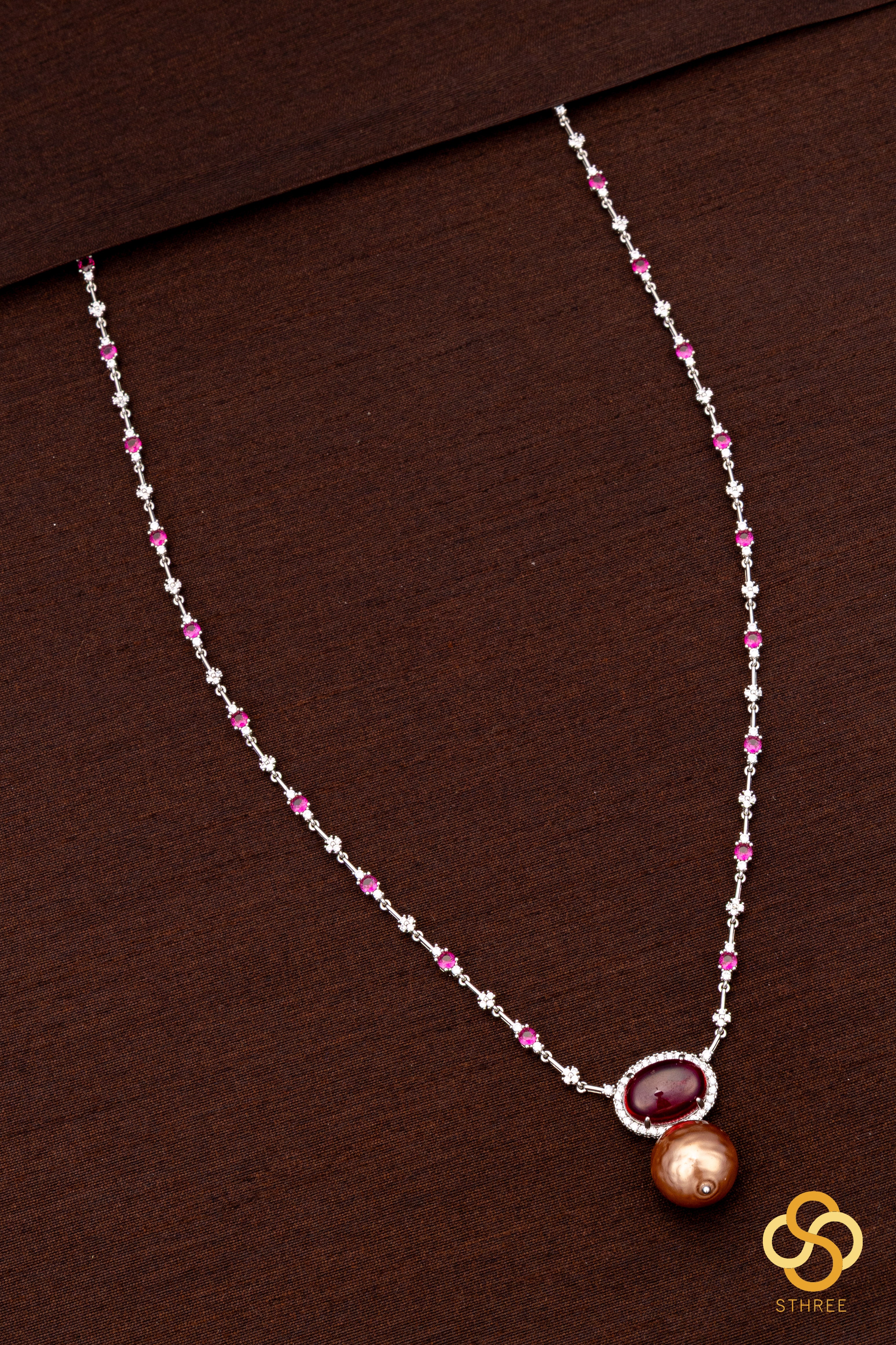 Zircon and ruby necklace set, with pearl hanging
