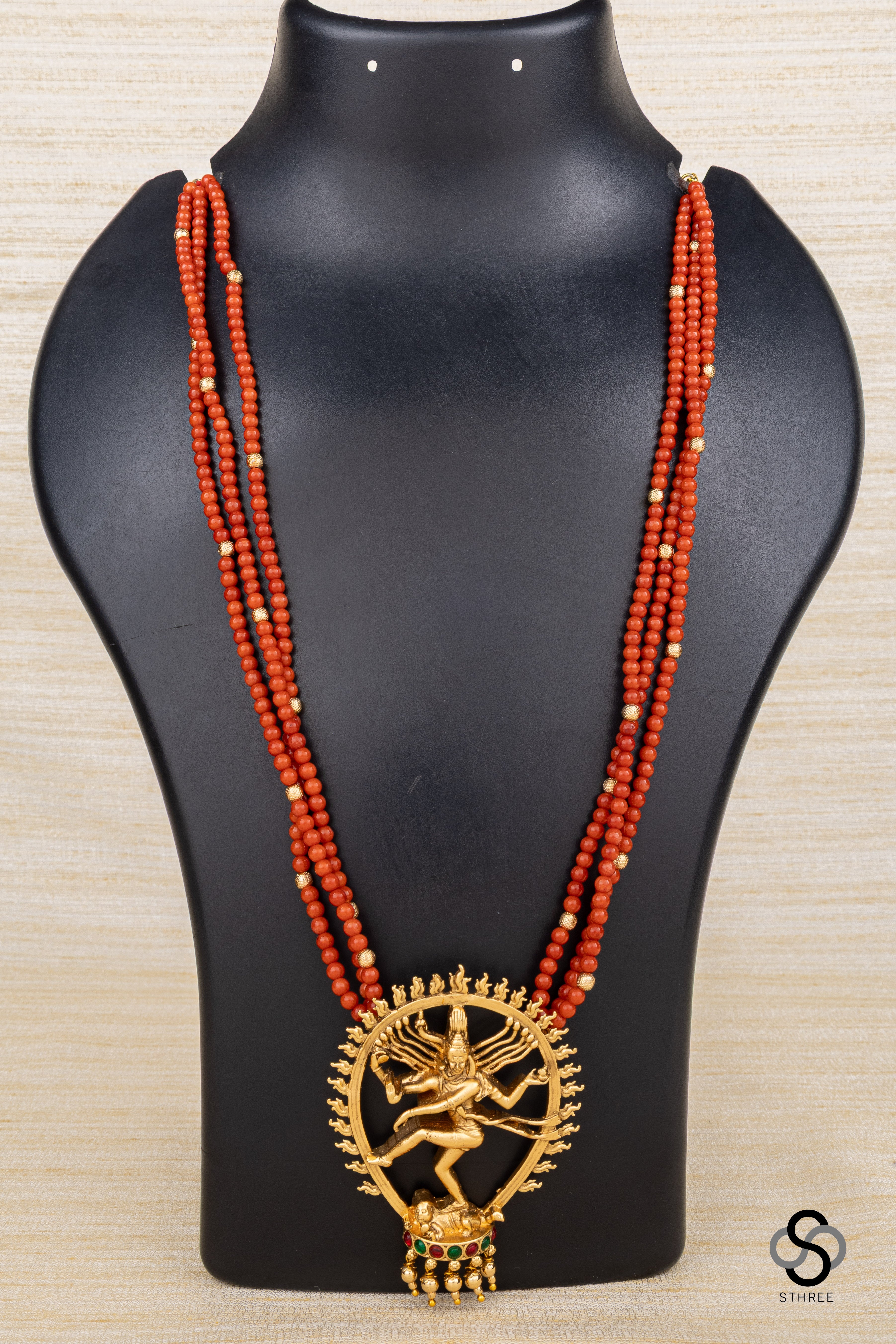 Natarajan pendant with three liner coral set