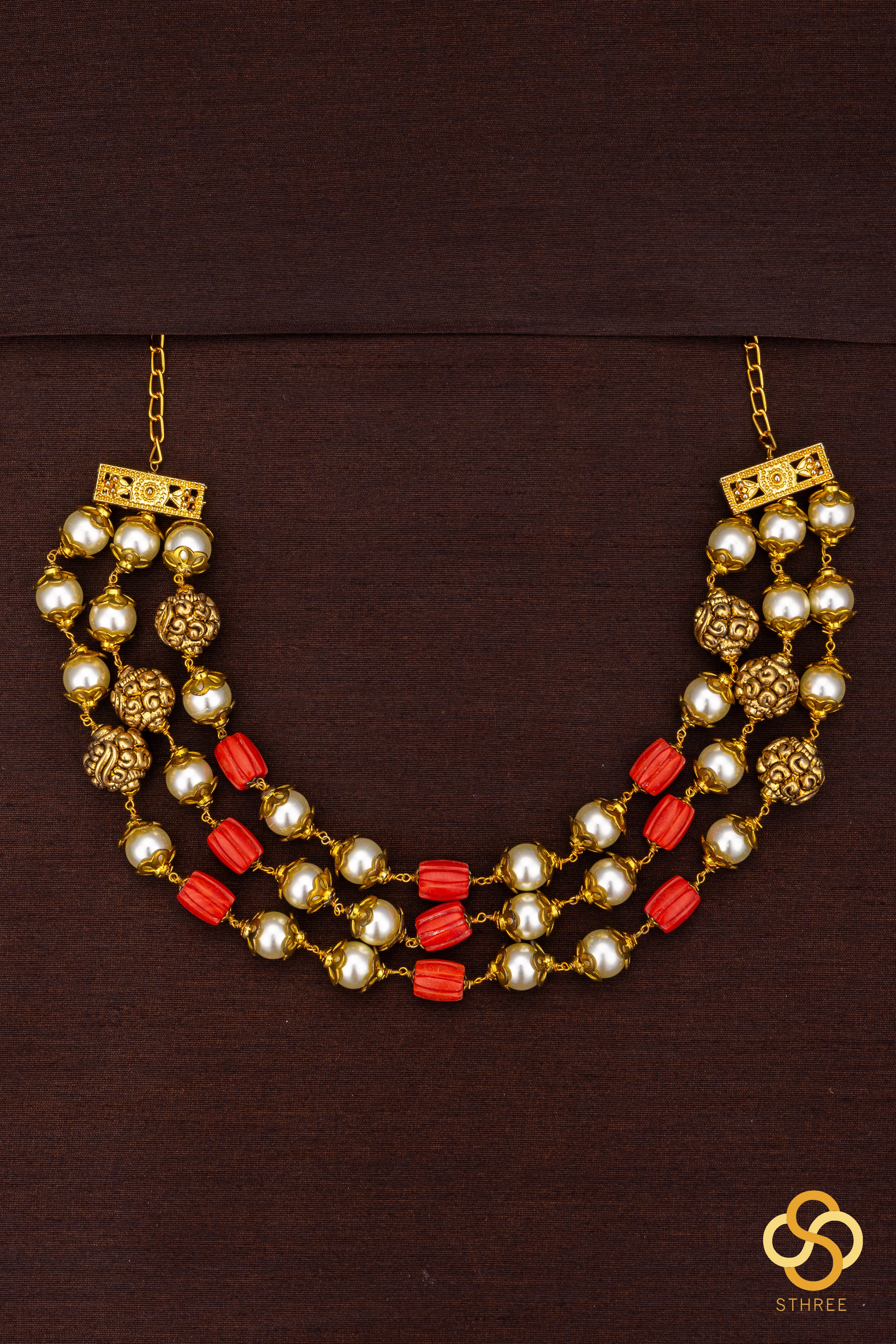 Three liner - Carved coral, pearls and gold balls