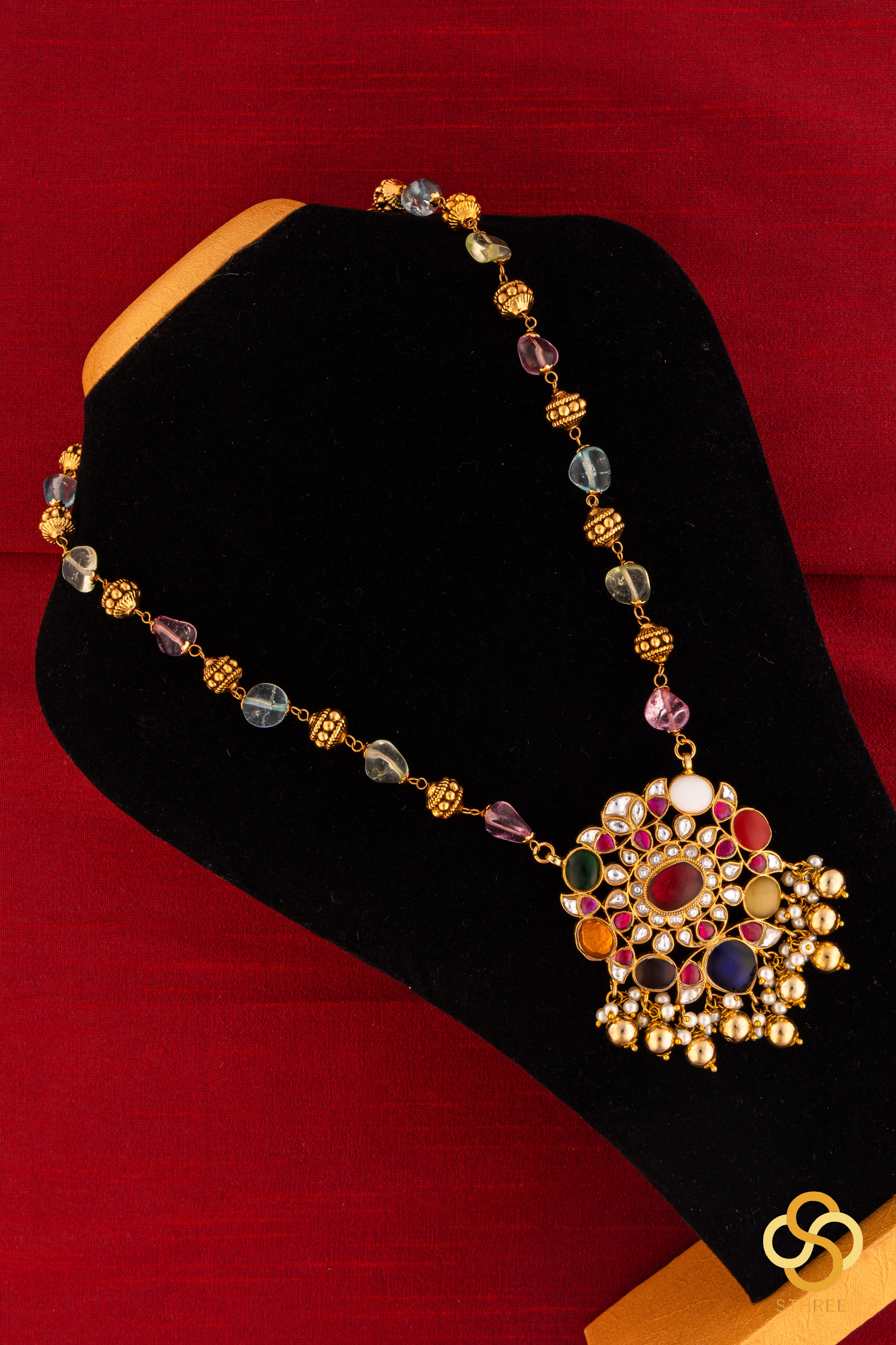 Navarathna pendant in Gold ball and Multi colour stone