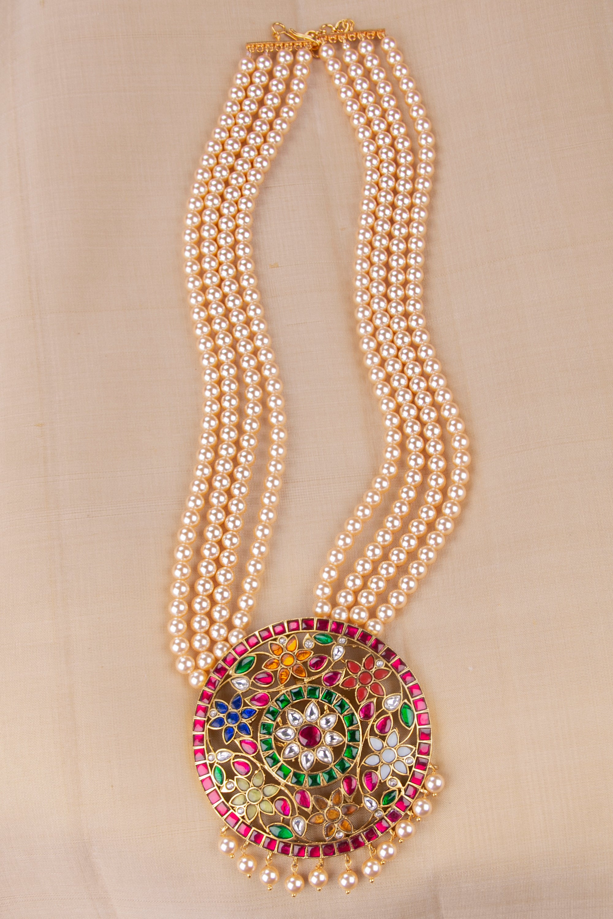 Rakkodi in Four Strands of Pearls