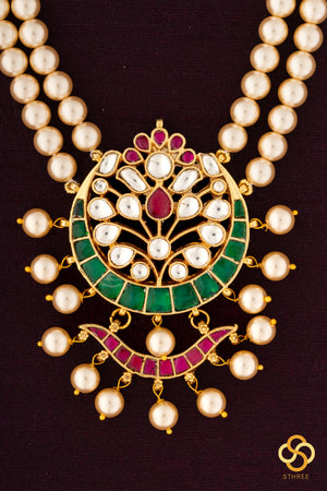 Swarovski two-liner pearls with a chandbali pendant - Emerald green