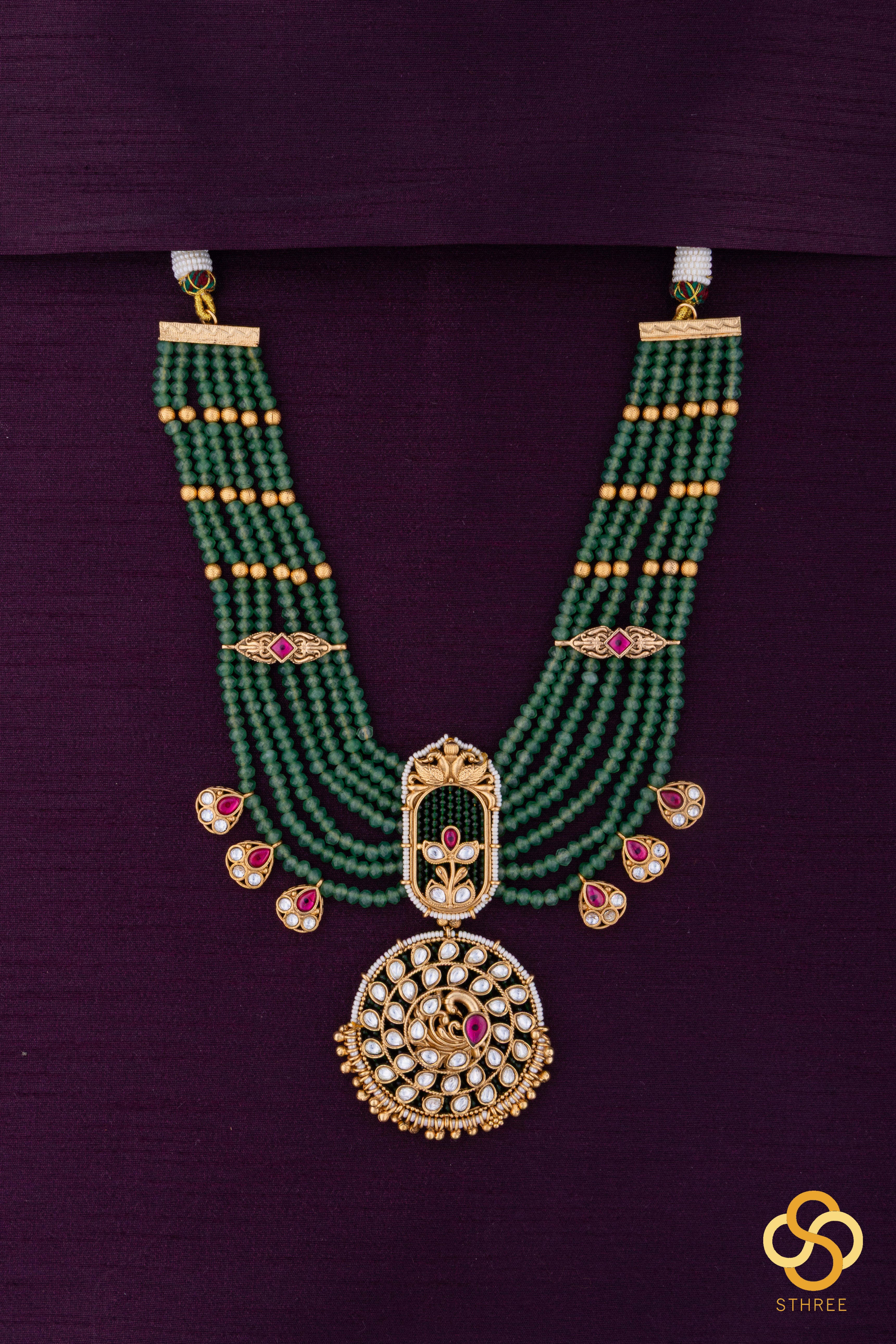 Emerald green (7 liner) with Jadau kundan pendant - White mogappu