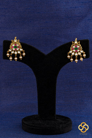 Swarovski three-liner pearls with a chandbali pendant and mogappu
