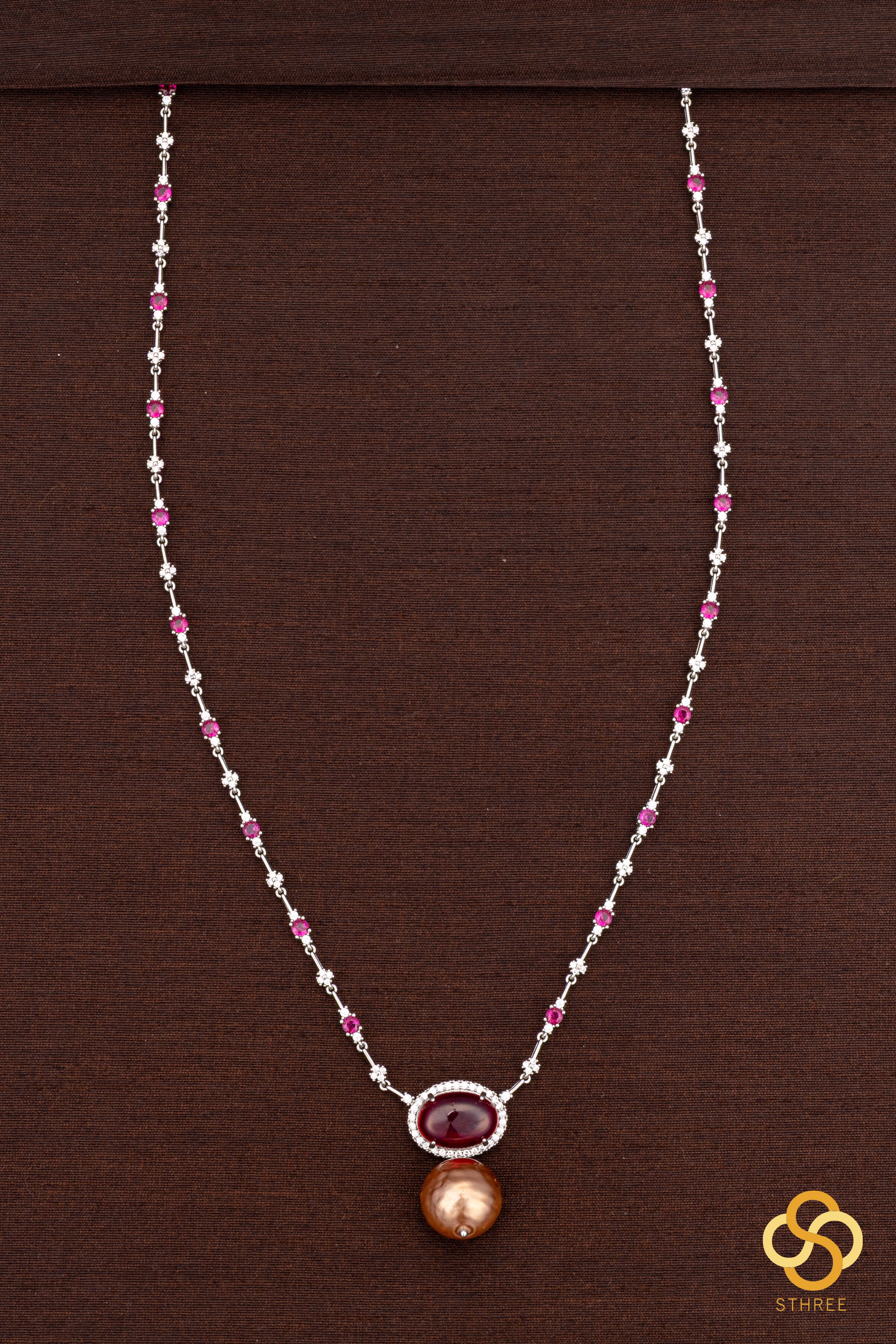 Zircon and ruby necklace set, with pearl hanging