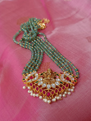 Lakshmi kundan set in green beads