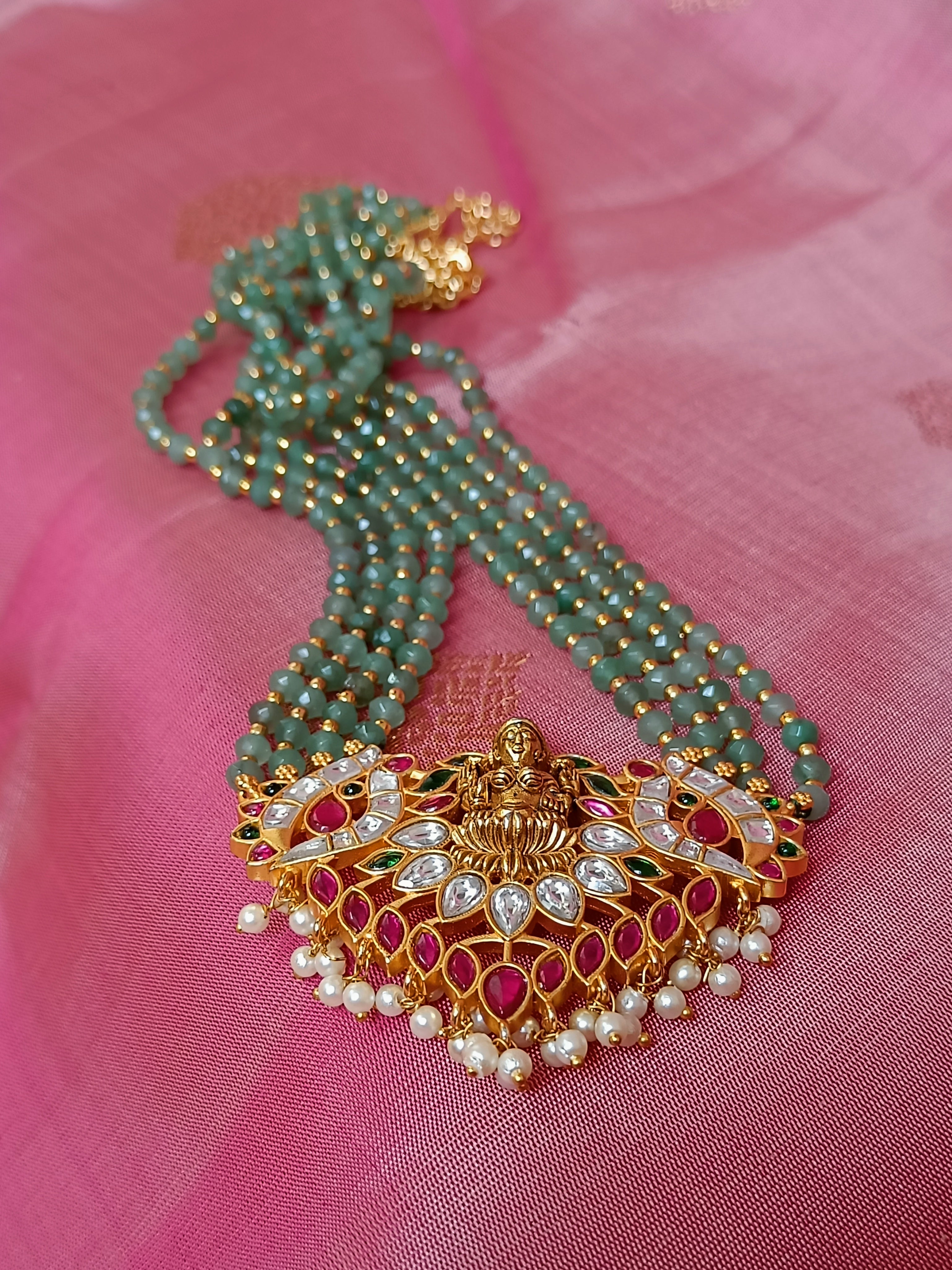 Lakshmi kundan set in green beads