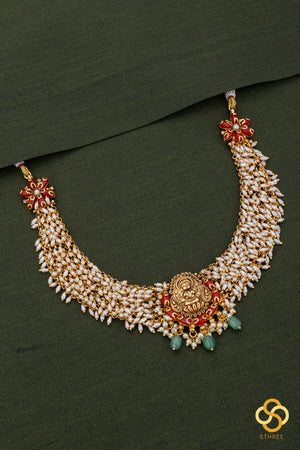 Lakshmi pendant with pearls