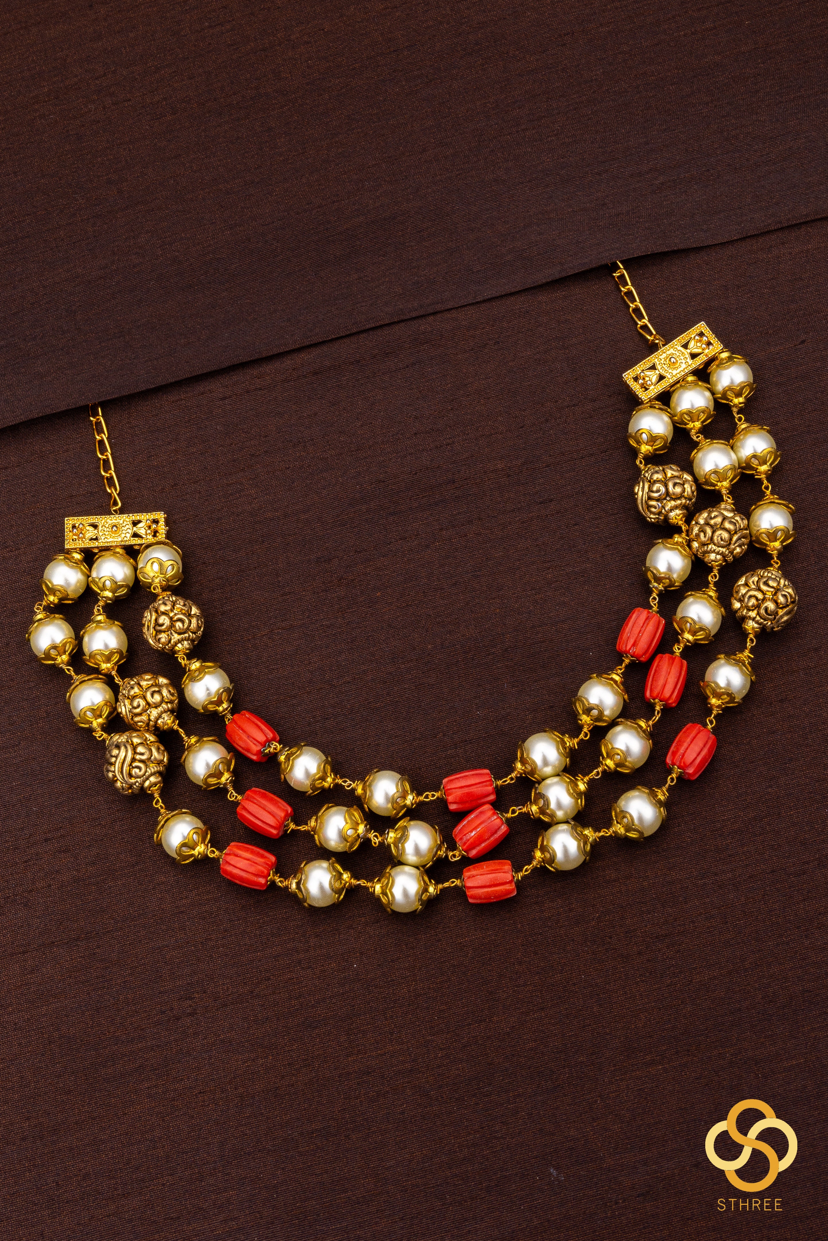 Three liner - Carved coral, pearls and gold balls