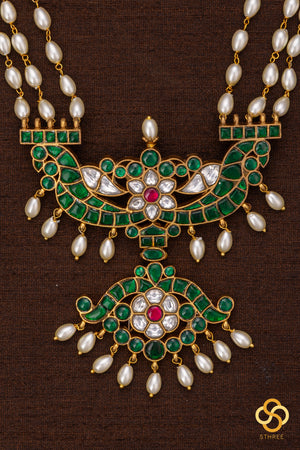 Three liner pearls with Emerald green pendant